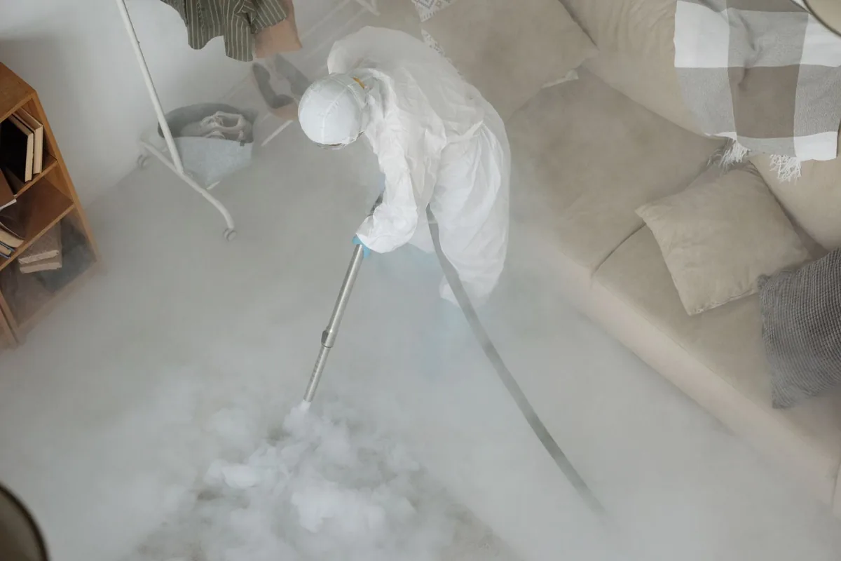 Biohazard cleanup technician in protective equipment, Stephens City, VA